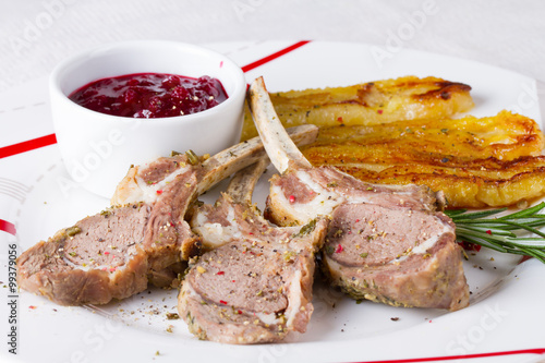 Rack of lamb with cranberry sauce and fried bananas