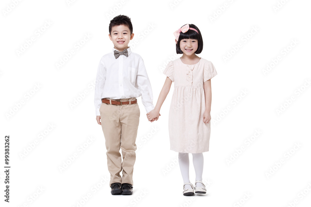Cute boy and girl hand in hand standing Cute boy and girl hand in hand standing
