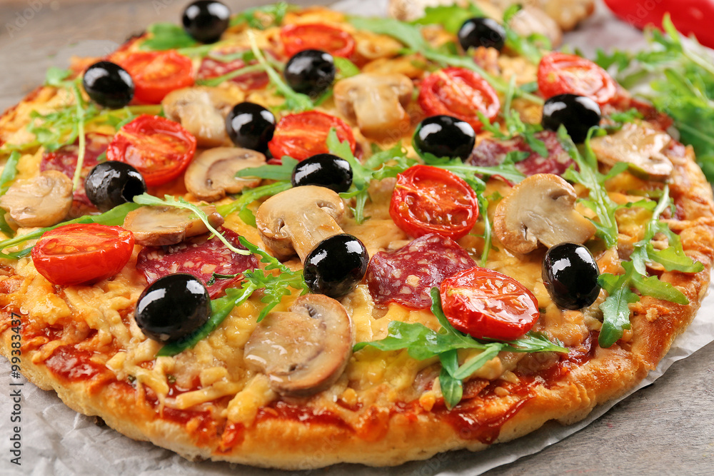 Delicious tasty pizza on table Delicious tasty pizza on table