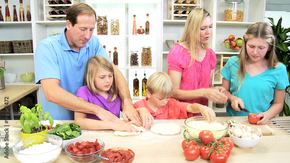 healthy lifestyle eating young Caucasian family fresh organic vegetables pizza healthy lifestyle eating young Caucasian family fresh organic vegetables pizza