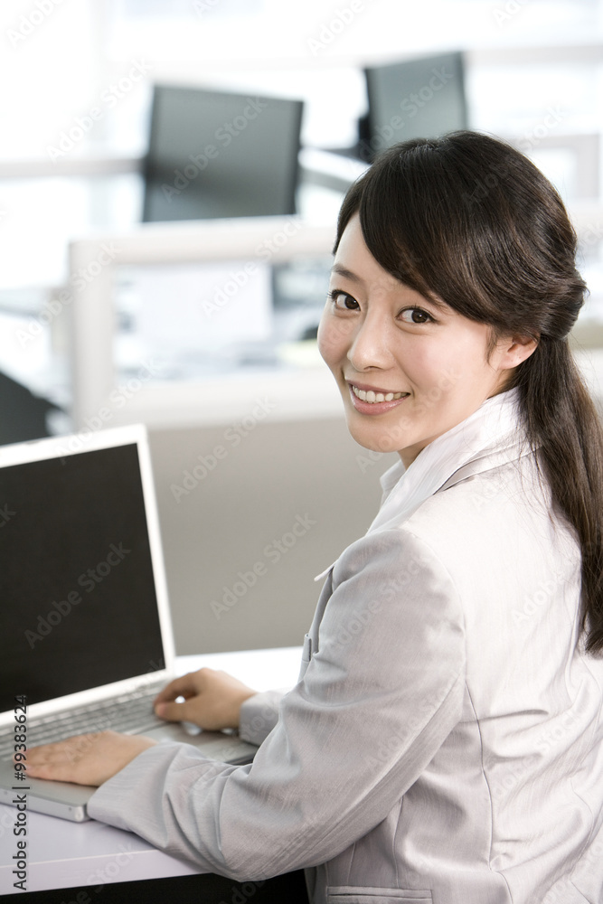 Office worker at her desk Office worker at her desk