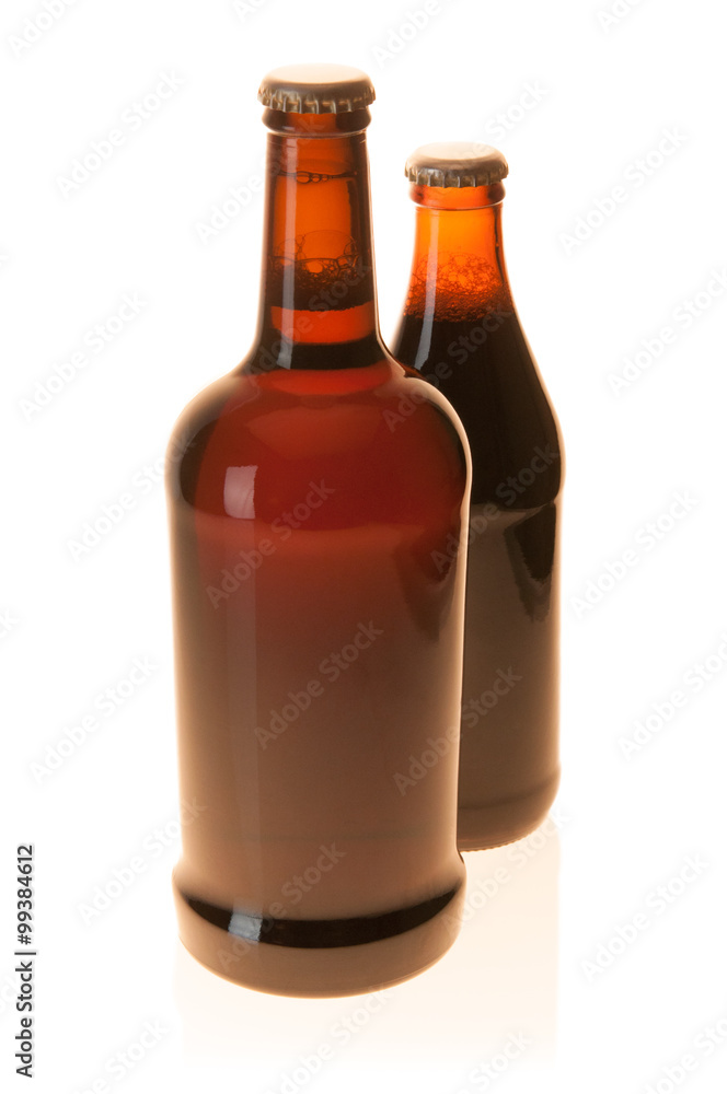 Large and Small Brown Beer Bottles On White Background Large and Small Brown Beer Bottles On White Background