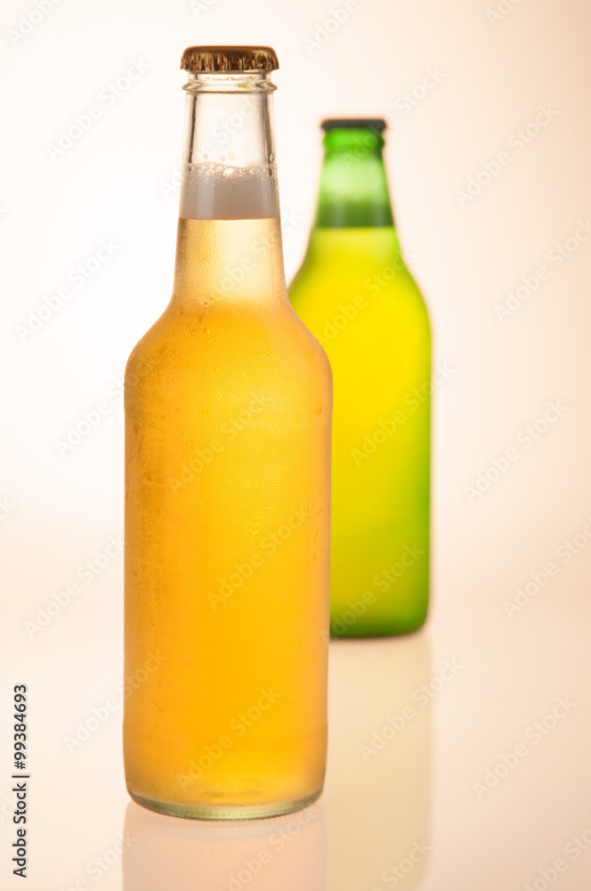 Yellow and Green Beer Bottles With Depth of Field Yellow and Green Beer Bottles With Depth of Field