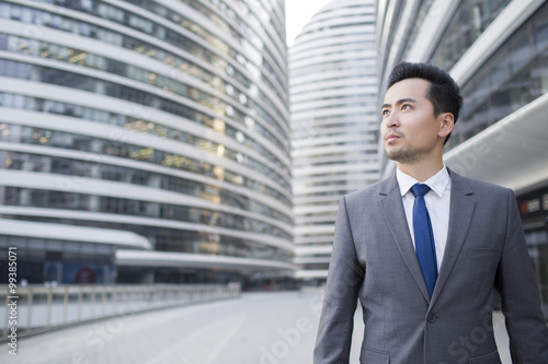 Businessman looking at view