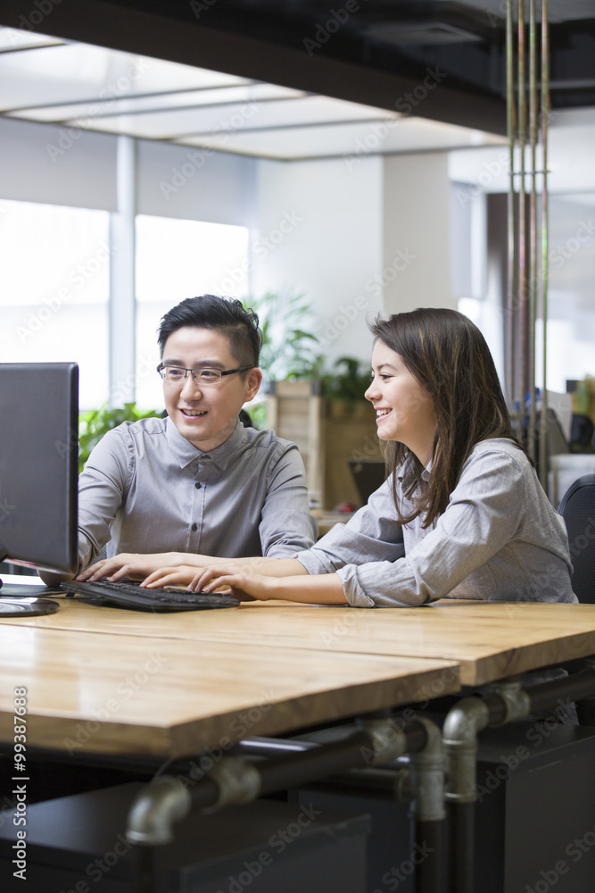 IT workers talking in office IT workers talking in office