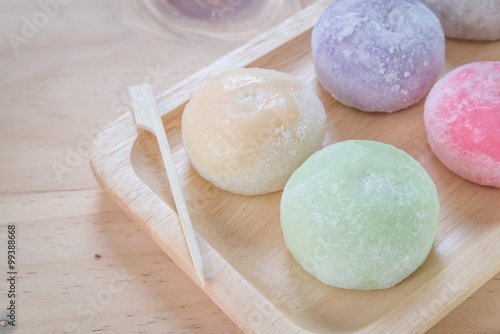 The colorful mochi dessert ice cream on wood plate ,Close Up photo with selective focus. photo