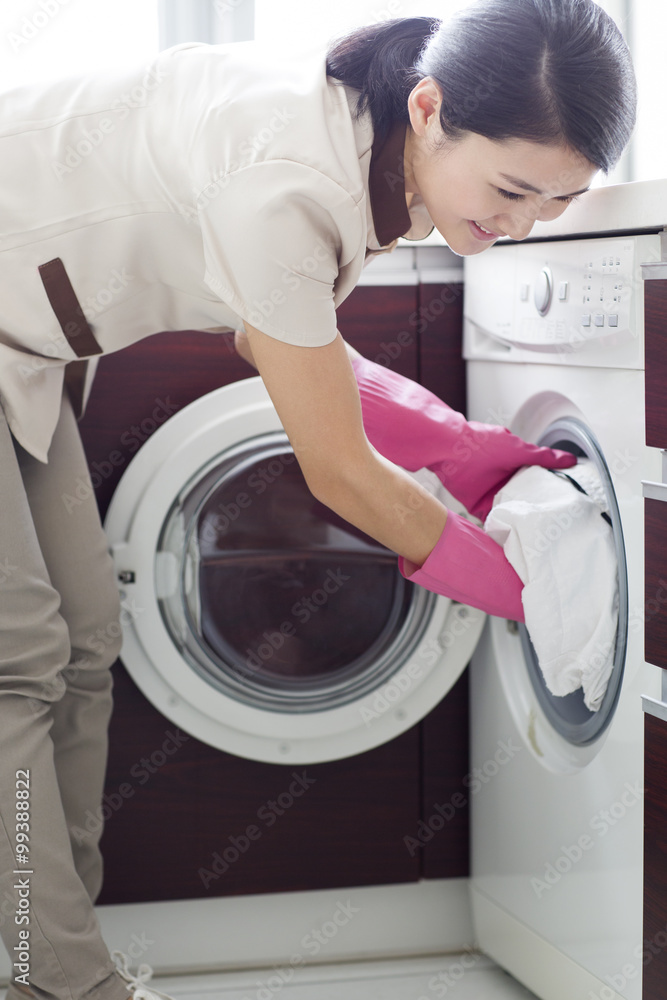 Domestic staff doing laundry Domestic staff doing laundry