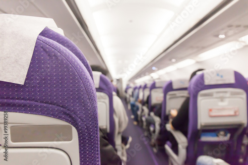 Fototapeta Naklejka Na Ścianę i Meble -  Interior of passenger airplane and aisle on plane