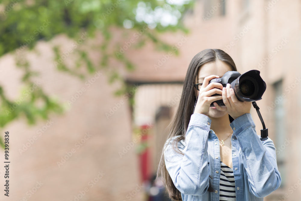 Female photographer taking photos Female photographer taking photos