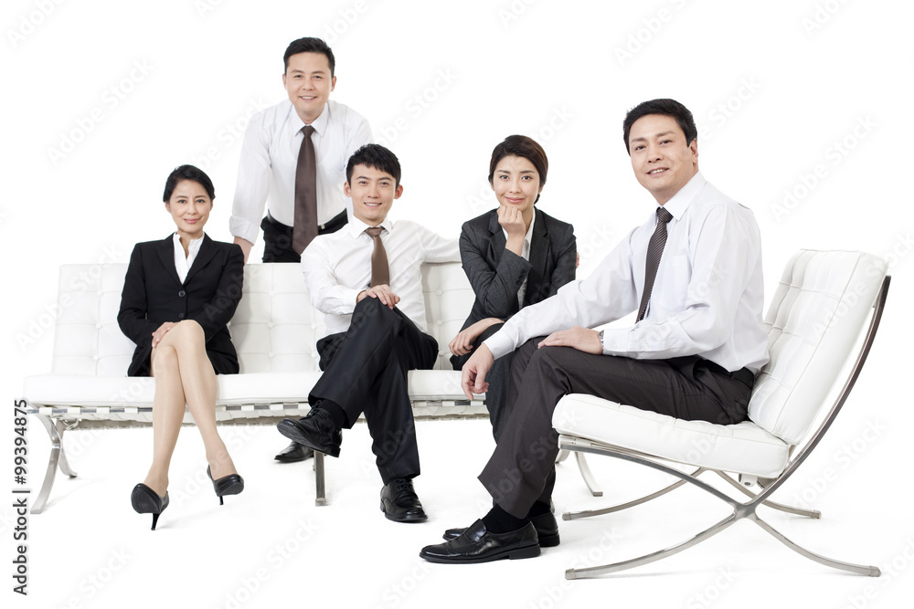 Professional business persons sitting in sofa
