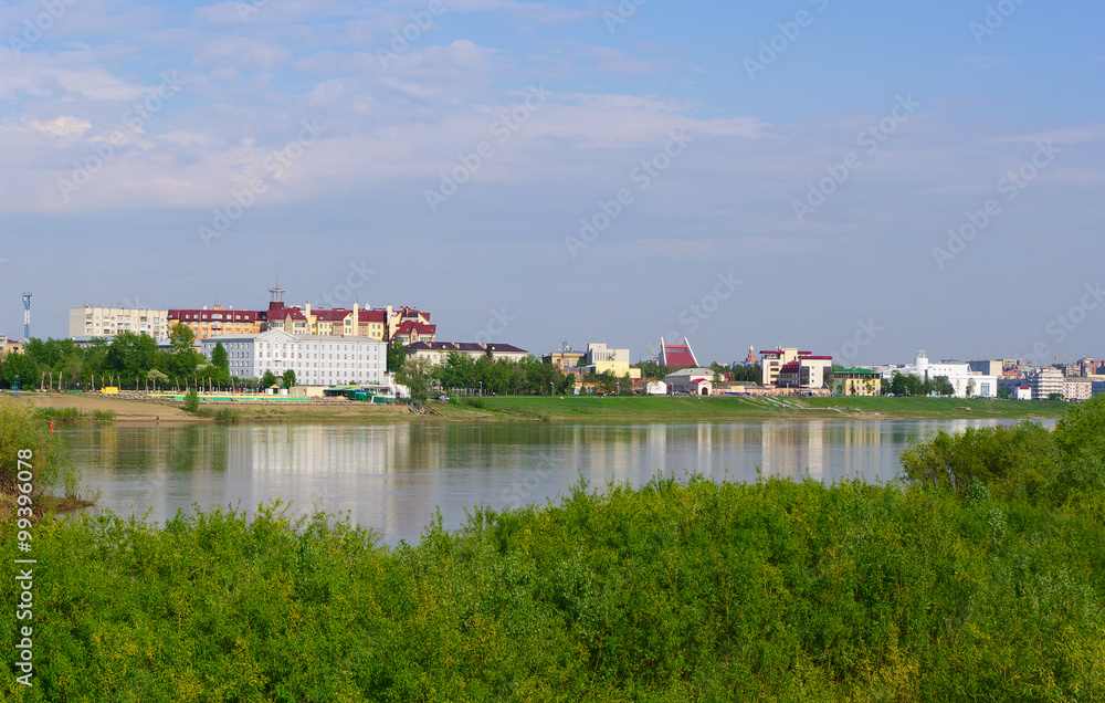 spring greenery banks of Irtysh river and panorama of city, Omsk, Russia spring greenery banks of Irtysh river and panorama of city, Omsk, Russia