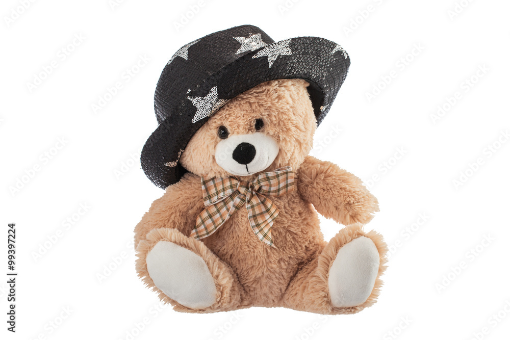 Fototapeta premium Fluffy teddy bear with party hat isolated on a white