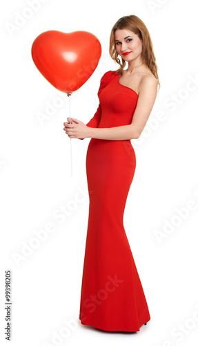lady in red dress with balloon in heart shape, romantic concept © soleg