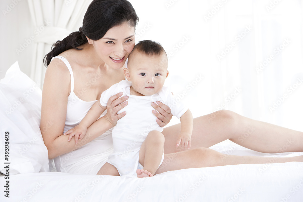 Mother and baby having a sweet time Mother and baby having a sweet time