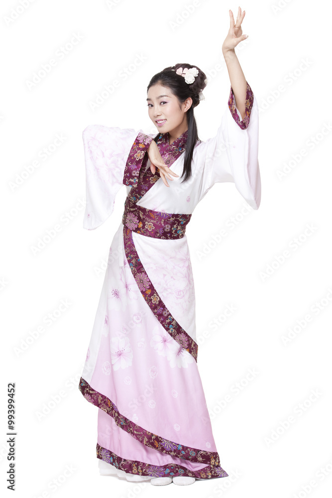 Happy young woman dancing in traditional Chinese costume Happy young woman dancing in traditional Chinese costume