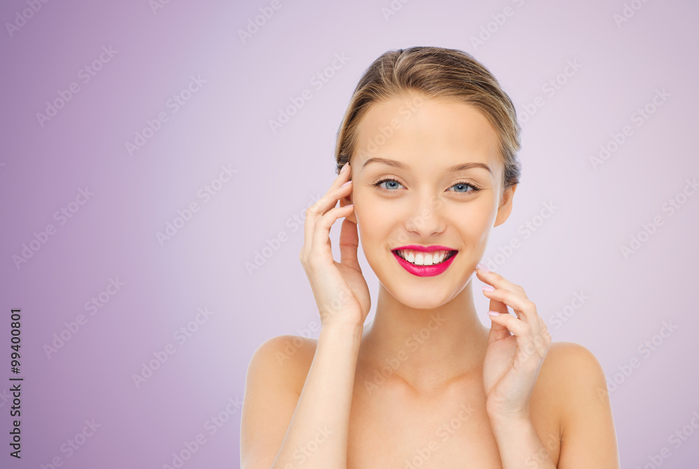 smiling young woman with pink lipstick on lips smiling young woman with pink lipstick on lips