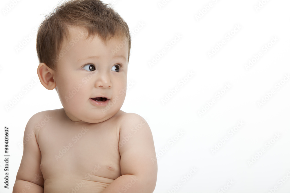 Studio shot of a cute baby boy looking away Studio shot of a cute baby boy looking away