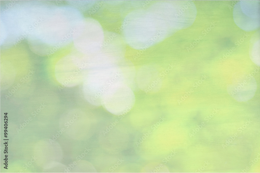 Obraz premium Green nature bokeh on canvas background, pastel background