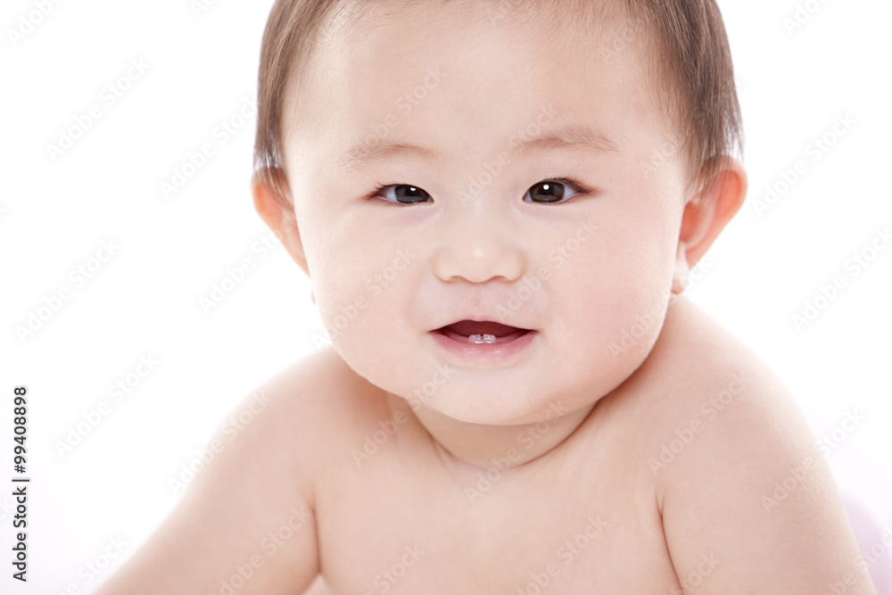 Studio shot of cute baby lying on floor Studio shot of cute baby lying on floor