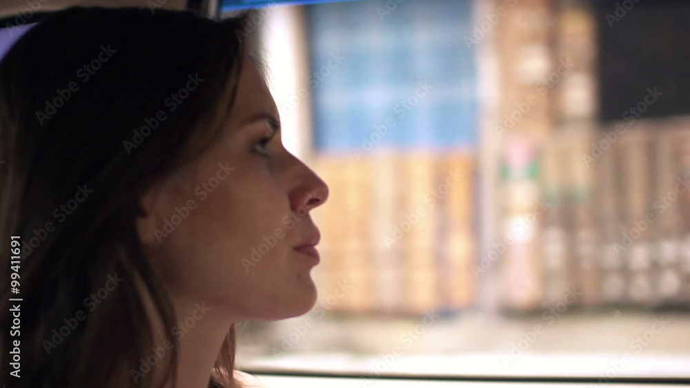 Young, pensive woman in car
Young, pensive woman in car