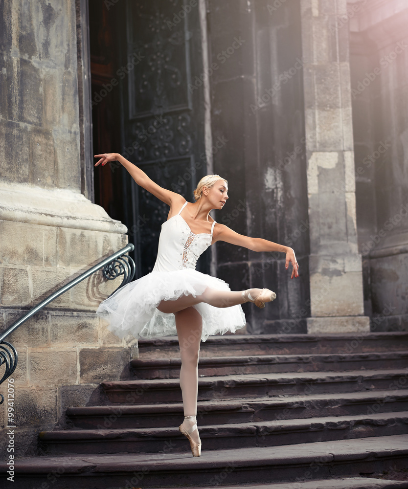 Obraz premium Imagine her performing. Full length shot of a talented ballerina dancing near an old castle