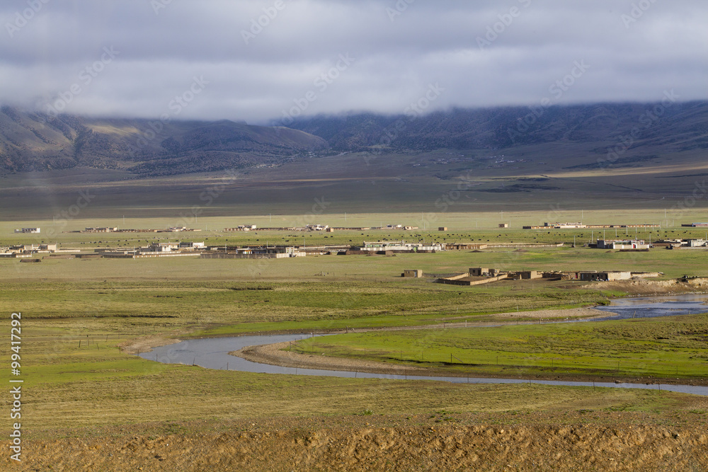 Obraz premium Beautiful village and river in Tibet, China