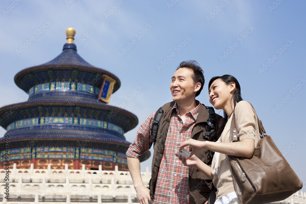 Young couple travelling at Temple of Heaven in Beijing, China