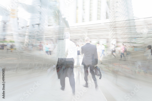 motion blur businessman walking to work