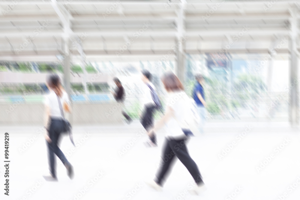 motion blur business people walking to work