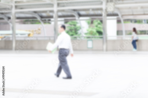 blur office worker walking to work