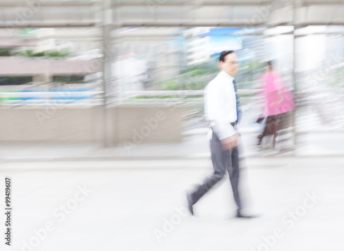 motion blur businessman walking to work © rottoro