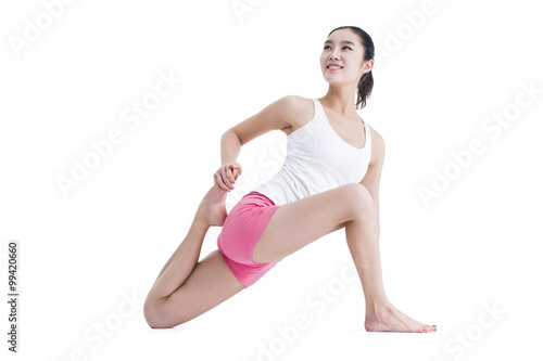 Young woman practicing yoga