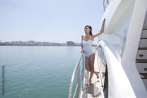 Young Woman Relaxing on a Yacht