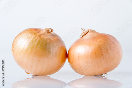 two onions isolated on white background