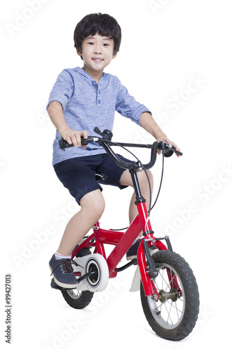 Happy boy riding bike