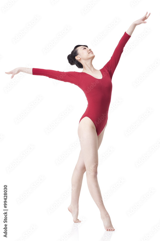 Female gymnast performing rhythmic gymnastics