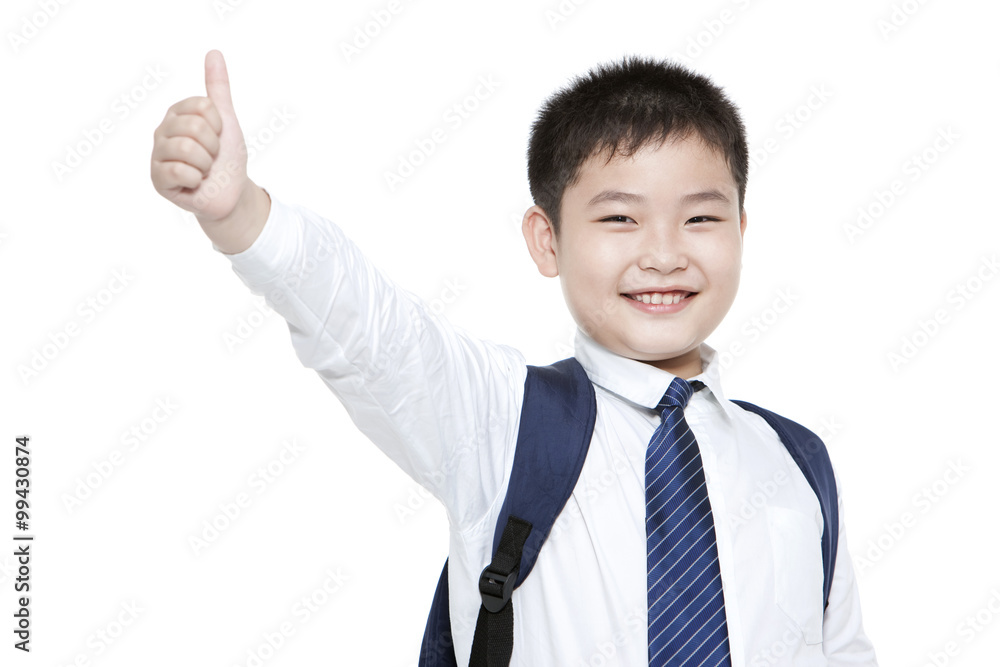Portrait of cheerful schoolboy showing thumbs up Portrait of cheerful schoolboy showing thumbs up