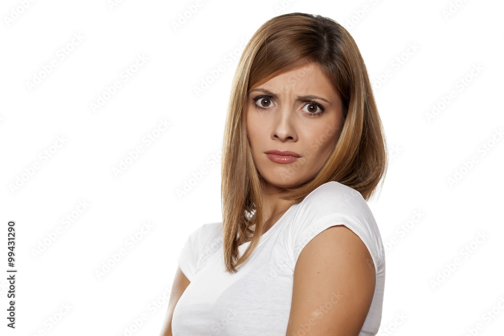 unhappy young woman with questionable gesture unhappy young woman with questionable gesture