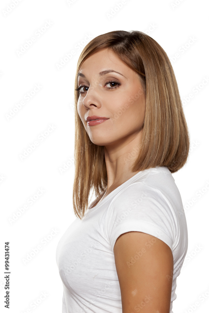 smiling and proud young woman on a white background smiling and proud young woman on a white background