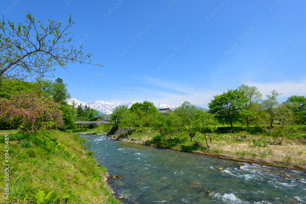 Shirouma mountains and Himekawa river at Ooide park in Hakuba, Nagano, Japan Shirouma mountains and Himekawa river at Ooide park in Hakuba, Nagano, Japan
