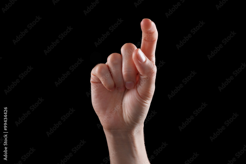 Gesture, young woman's hand indicates the direction or touch devices Gesture, young woman's hand indicates the direction or touch devices