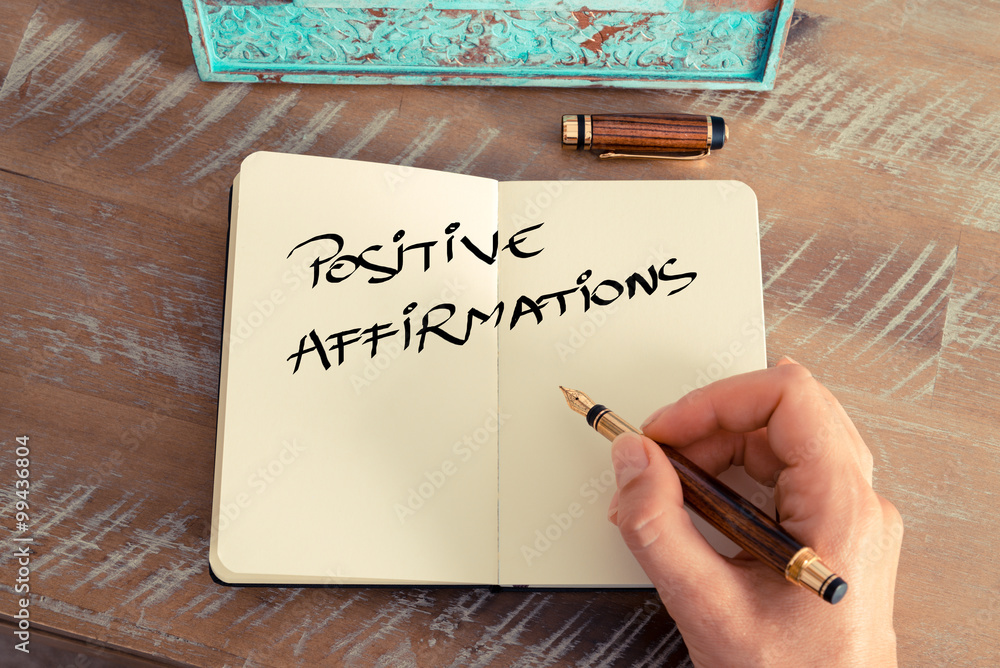 Motivational concept with handwritten text POSITIVE AFFIRMATIONS