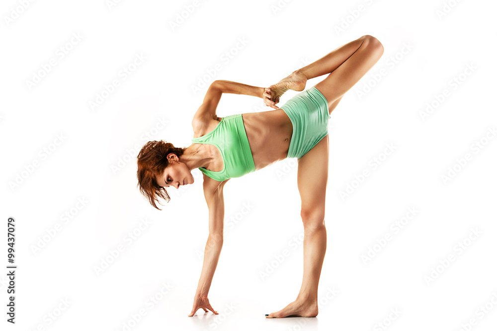 Fototapeta premium beautiful young girl engaged in yoga, gymnastics, fitness