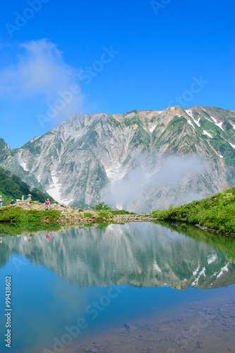 Fototapeta Naklejka Na Ścianę i Meble -  Shirouma mountains and Happo-ike Pond at Happo-one in Hakuba, Nagano, Japan