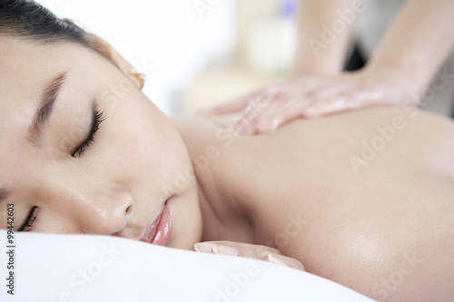 Woman Receiving A Back Massage