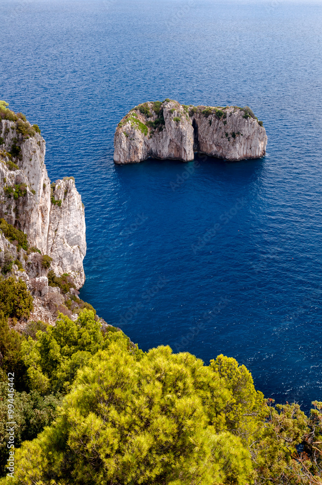 Stone islands and cliff on Capri coast