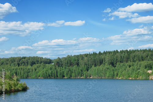 Landscape of beautiful lake in wood open-cast mine