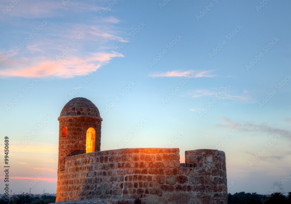 lighted watch tower during dusk