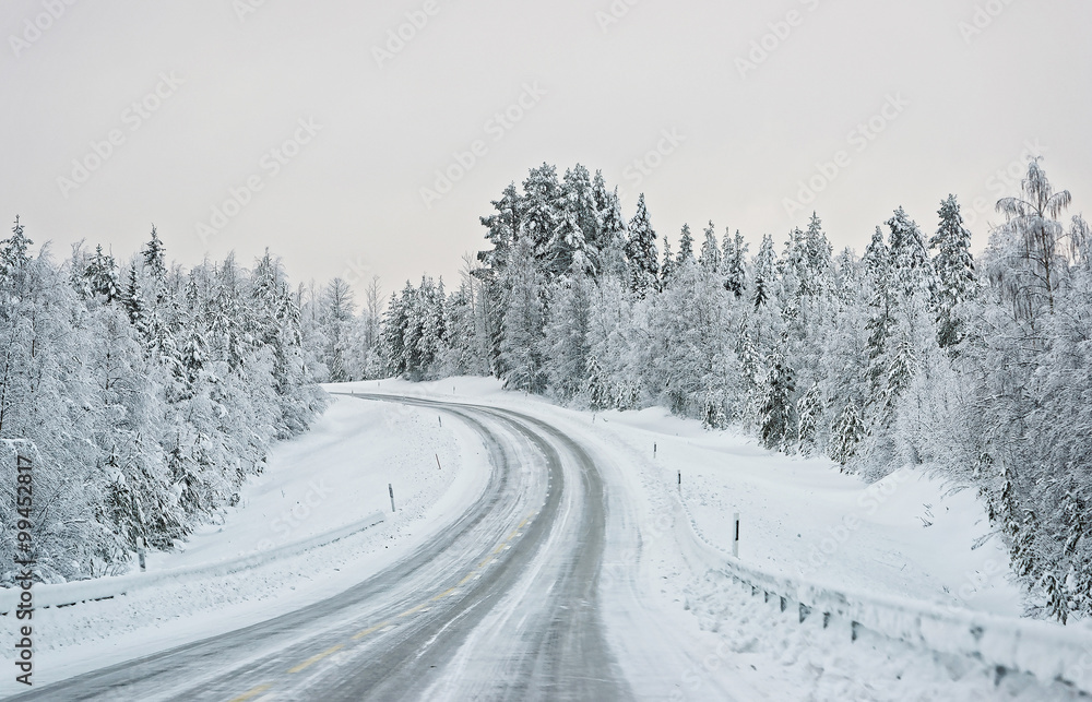 Serpentine road in  Ruka in Finland on the Arctic pole circle