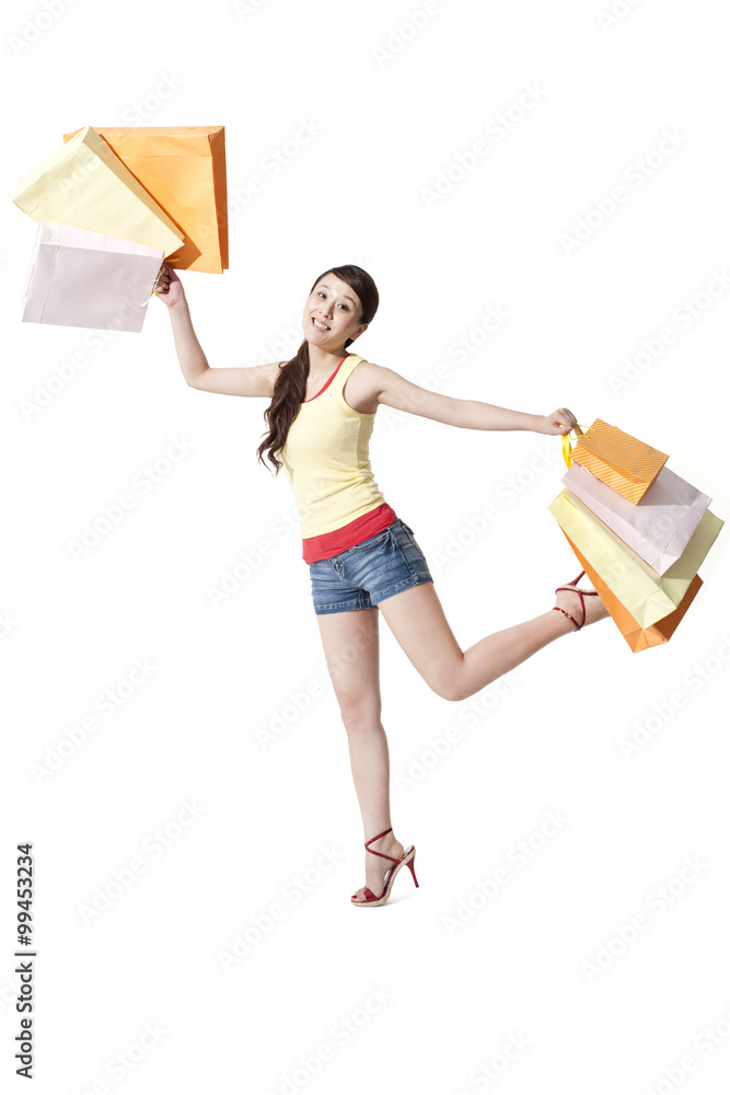 Happy young woman with shopping bags Happy young woman with shopping bags